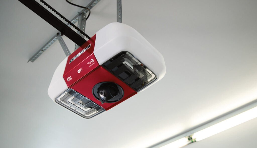 Technician installing a new garage door opener for smooth and secure operation.