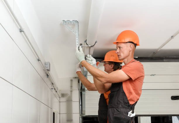 Close-up of a garage door panel being installed during a panel replacement service.